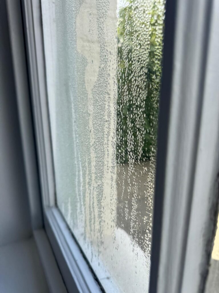 Living room wall freshly replastered after damp treatment